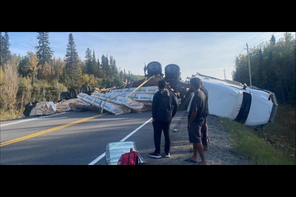 A tractor-trailer lost its load on Highway 11 east of Rocky Bay First Nation at about 5:30 pm on Sunday. (Skilled Truckers Canada/Facebook)