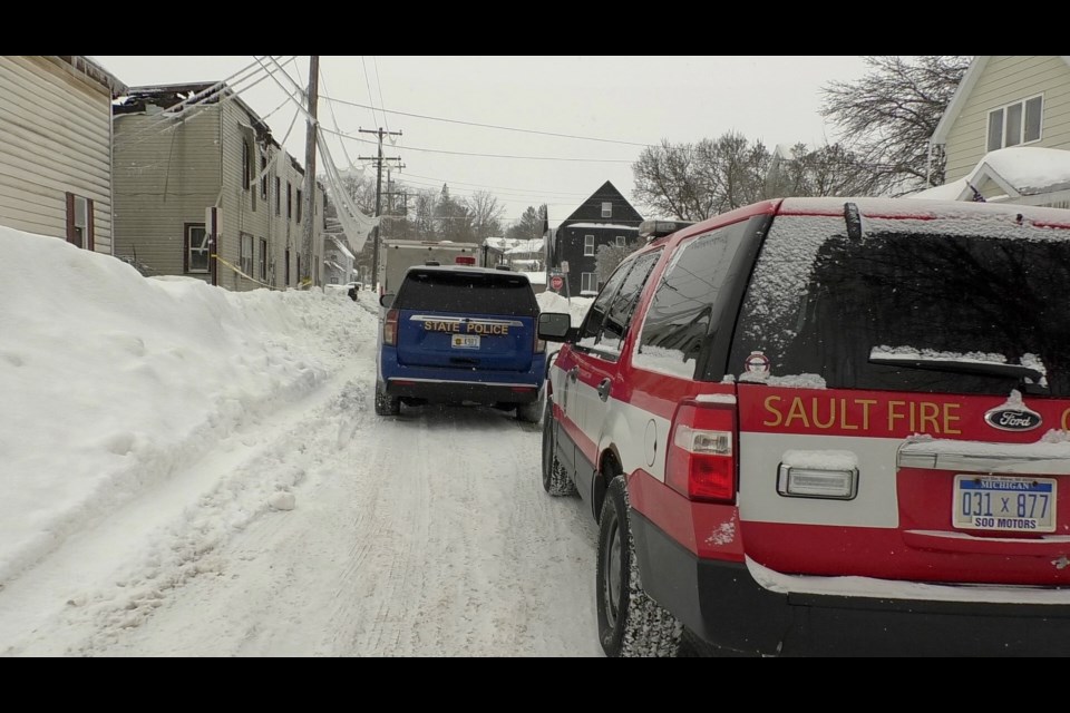 Fire investigators are at the scene of Wednesday night's fire on the corner of Helen Street and Leroy Street