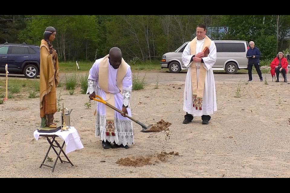 Rev. Dominic Afrifa breaks ground for the new St. Kateri Tekakwitha Mission Catholic Church