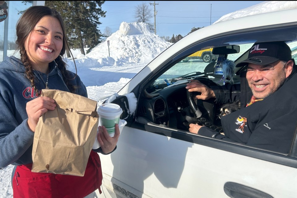 Maurice Dunn arrived more than 30-minutes before Clyde's open opened up at 11am.  Here he gets his chili-cheese fries, deep-friend mushrooms, bacon-cheese burger andmushroom-swiss burger delivered by a car hop.