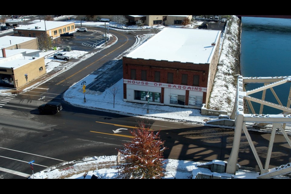 The House of Bargains building located at the Ashmun Street bridge will be torn down in Spring 2024.