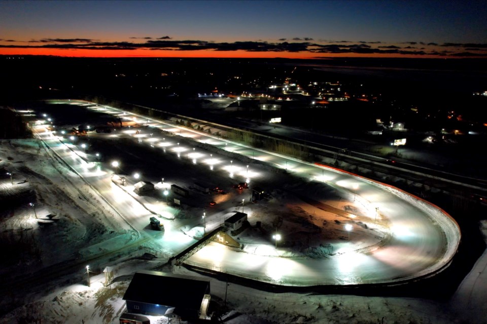 Volunteer crews at the I-500  continue to work around the clock to ready the one-mile track for the Feb. 1 race day.