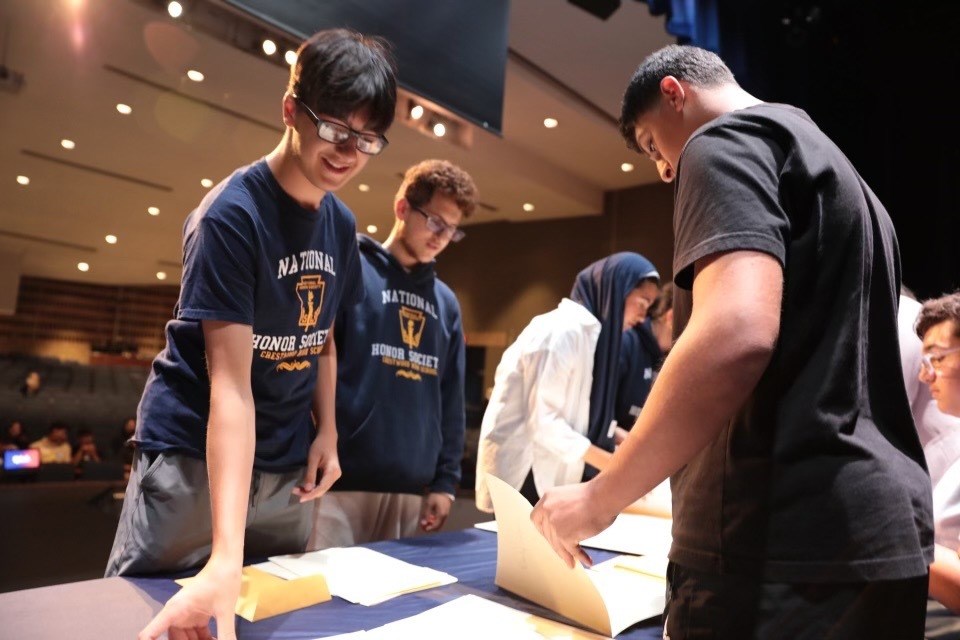 During a mock election, students decide on a topic for the election, nominate candidates, and then vote