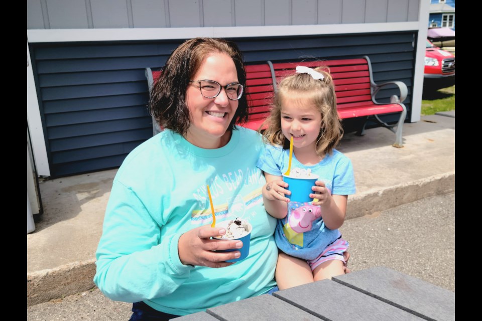 Heather Leep and Hattie, 4, about to enjoy ice cream while supporting Sault Area Little League at Alpine Chocolat Haus