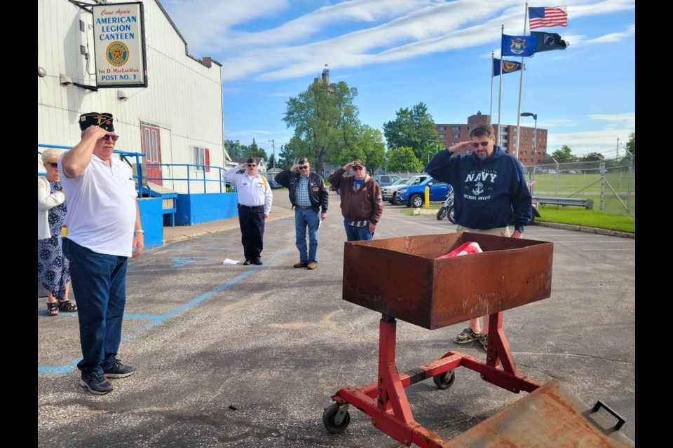 American Legion Post No. 3 burns "unserviceable" American flag on Flag Day