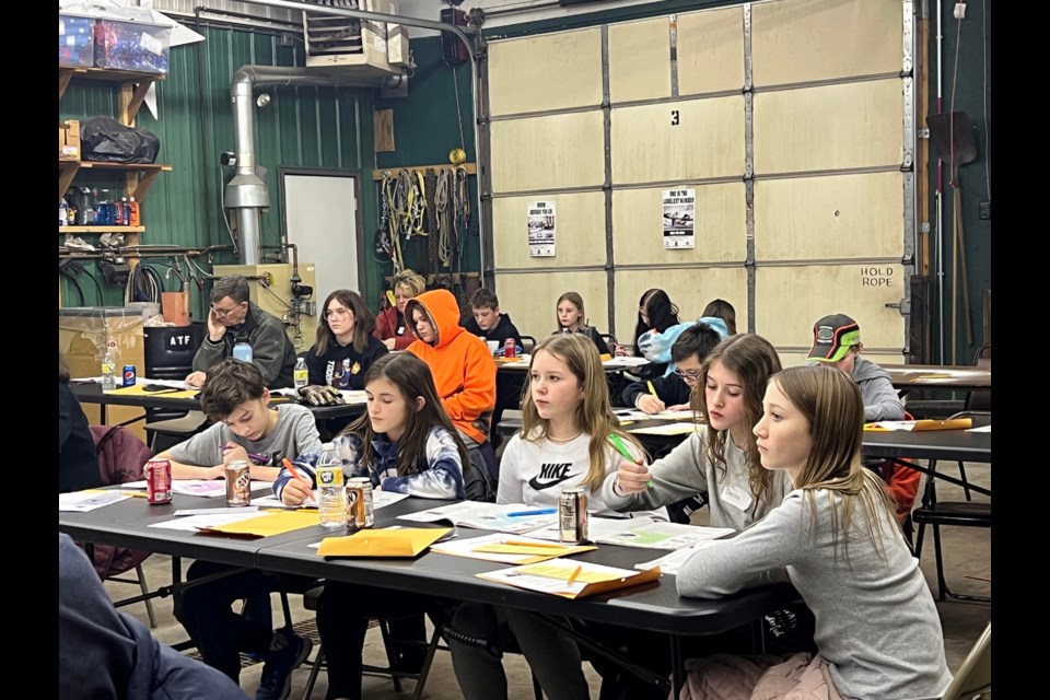 Les Cheneaux Snowmobile Club President Rod Walch and his wife, Becky, teach 49 snowmobile riders Michigan laws and safety on Saturday, Jan. 7, 2023