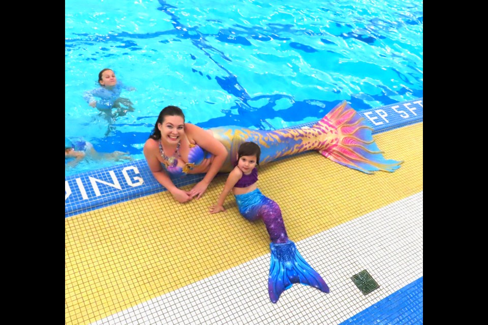 Miss Michigan Mermaid with a little LSSU mermaid 