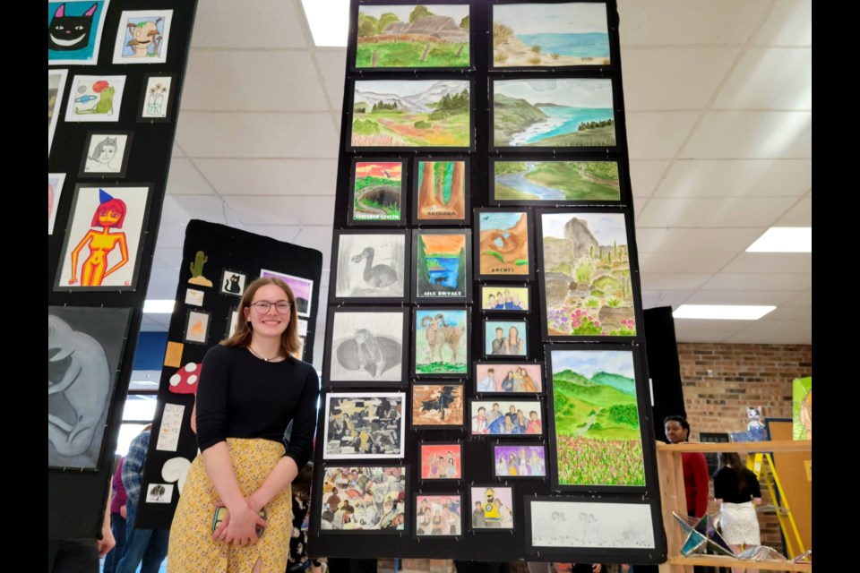 Sault Area High School Senior Alyvia Lori displays stained glass, charcoal and water color art