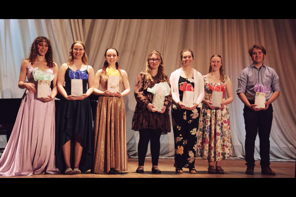 Malia Lefebre, Olivia Martin, Miranda Allen, Brianna Petersen, Morgan Brow, Theresa Carey, and Gerrit Mulder perform at Soo Theatre Graduating Senior Recital Monday, May 8, 2023, drawing a crowd of more than 200 people