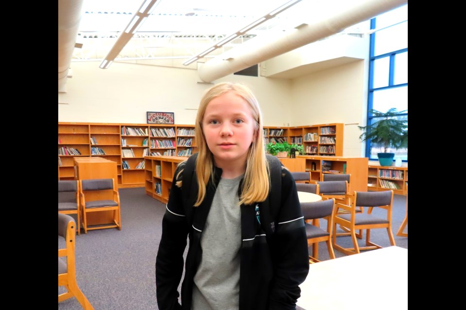 4-H ARTiculate Journalist member Olivia Nyboer, Grade 5, helps other students learn as a member of the Sault Area Middle School LINKS program