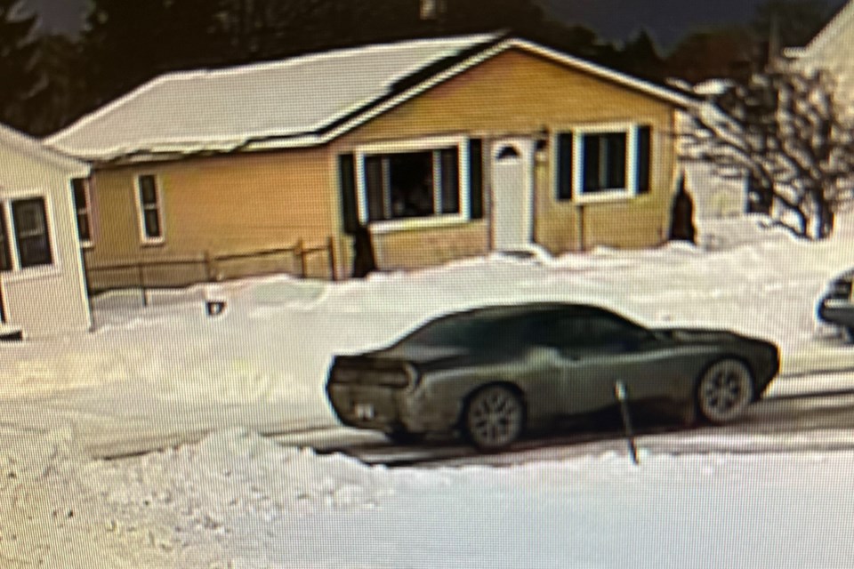 Michigan State Police are looking for a newer style black Dodge Challenger with tinted windows and a license plate on the front and rear of the vehicle.