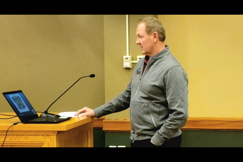 Neil Friske, a Republican candidate for state representative, makes a presentation to the Sault Ste. Marie City Commission on Monday.