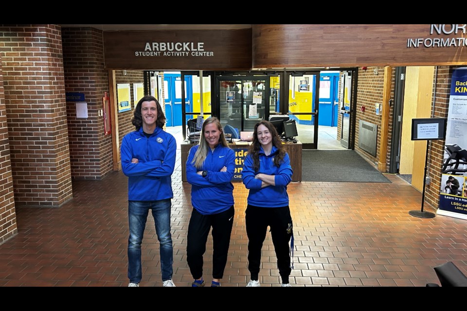 Aaron Nachazel, assistant track and field coach Dani Filipek, and Lindsey Tonello are excited to meet those at the Family Fun Day event Sunday.