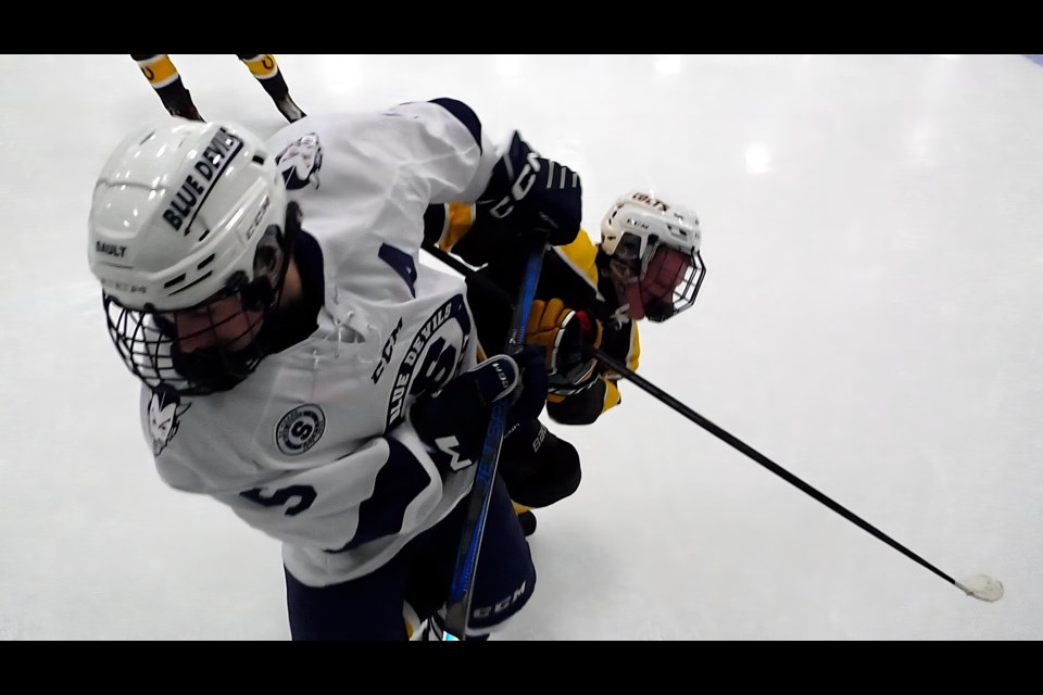 Koran Collegiate and Sault Blue Devils battled on the ice at Big Bear Arena Thursday evening.