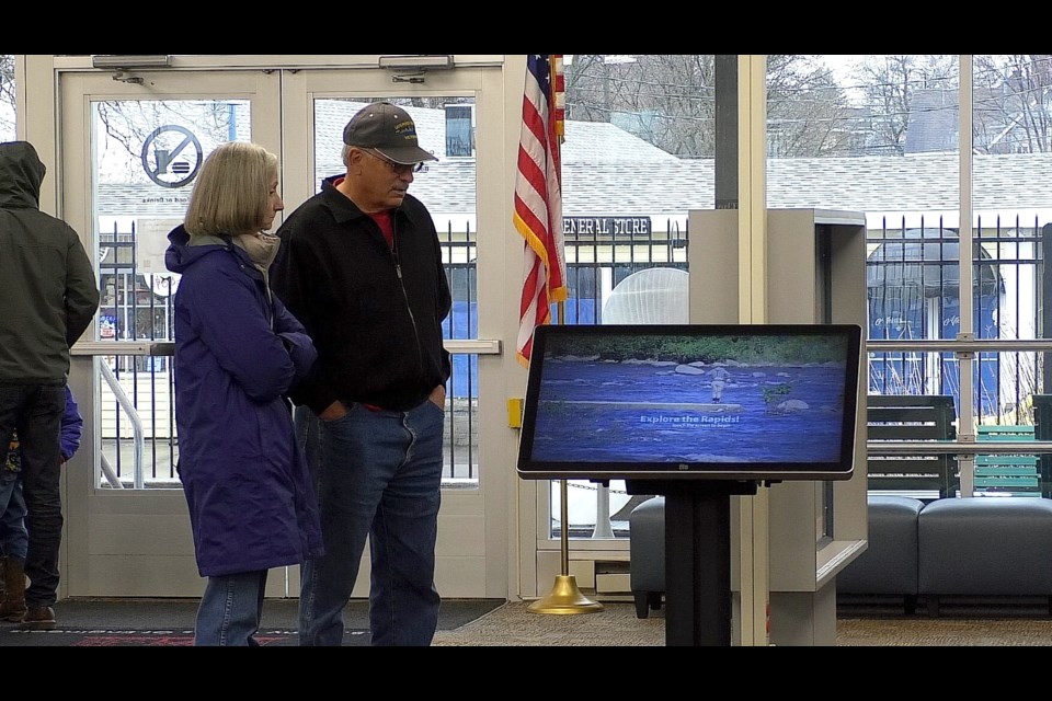 Visitors checking out the exhibits at the Soo Locks Visitor Center this morning.