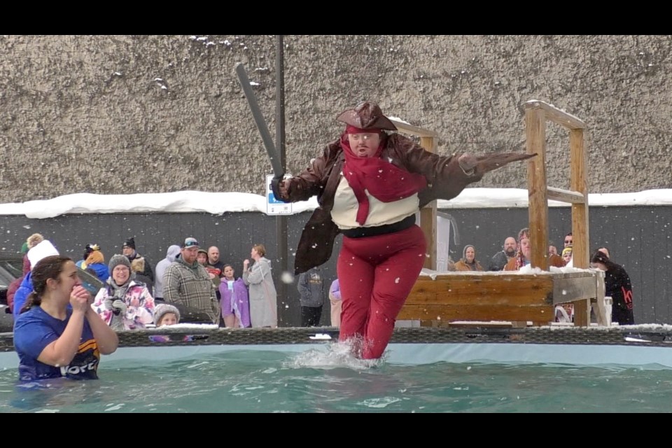 Dozens of brave people took the plunge Saturday morning to raise money for Special Olympics in downtown Sault, MI