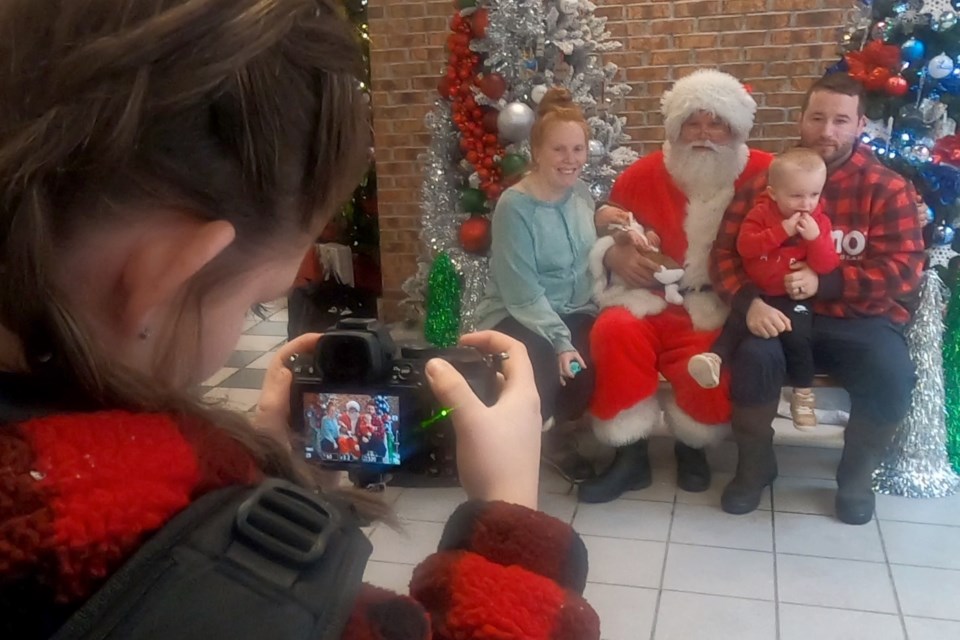 Downtown businesses opened their doors for the Downtown Holiday Open House Weekend with Santa and Mrs. Claus making an appearance at the Avery Center.