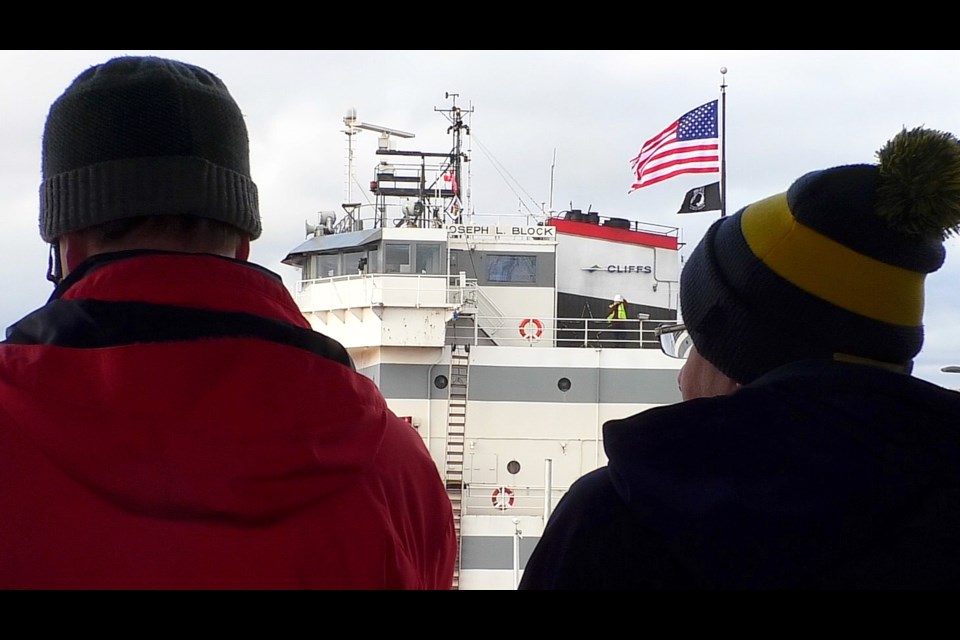 Hundreds of people packed the Soo Locks Park Friday evening to watch the first freighter of the season, Joseph L. Block, officially open up the Soo Locks.