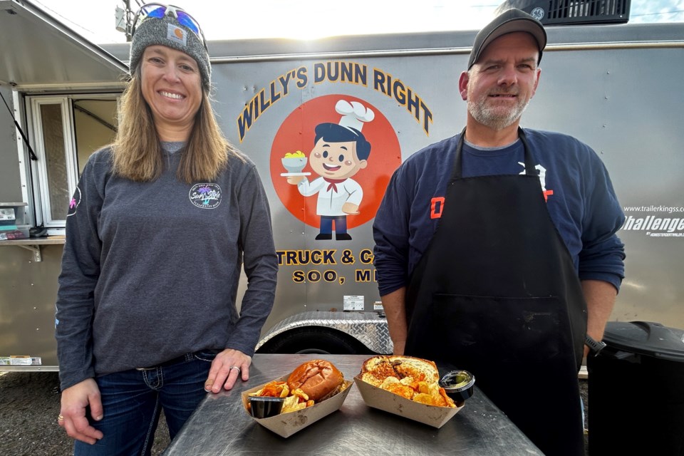 Willy's Dunn Right food truck and catering is available for year-round events.  Here Jen and Billy Cryderman show off two of their top menu items....the Smokehouse BBQ and the Grilled Cheese.