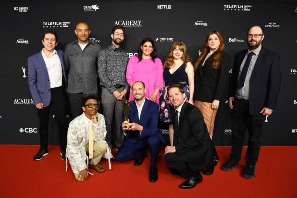 The Sault's Jordan Foisy (front row, middle), surrounded by writers, cast members, and crew from CBC's hit show 'This Hour Has 22 Minutes,' pose with the Canadian Screen Award they won for 'Best Writing, Variety or Sketch Comedy' in Toronto on May 31, 2024.