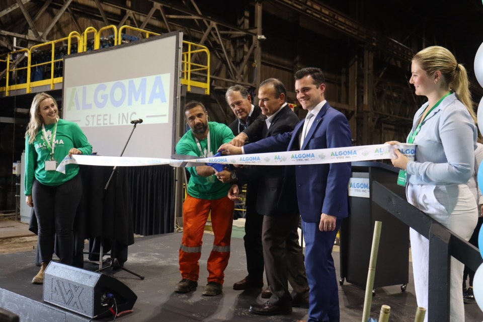 Algoma Steel CEO Michael Garcia and mayor Matthew Shoemaker helped cut the ribbon on the plate mill's historic upgrades that were celebrated on June 18.