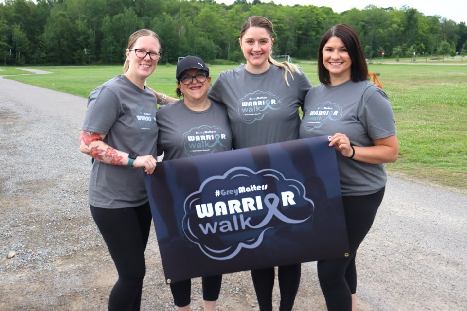 Brain tumour "warriors" Jordan Garson, Sally Coccimiglio, Shaylan Spurway Bubinas, and Kyleigh Provenzano helped lead Saturday's 27-km Warrior Walk at Anna McCrea