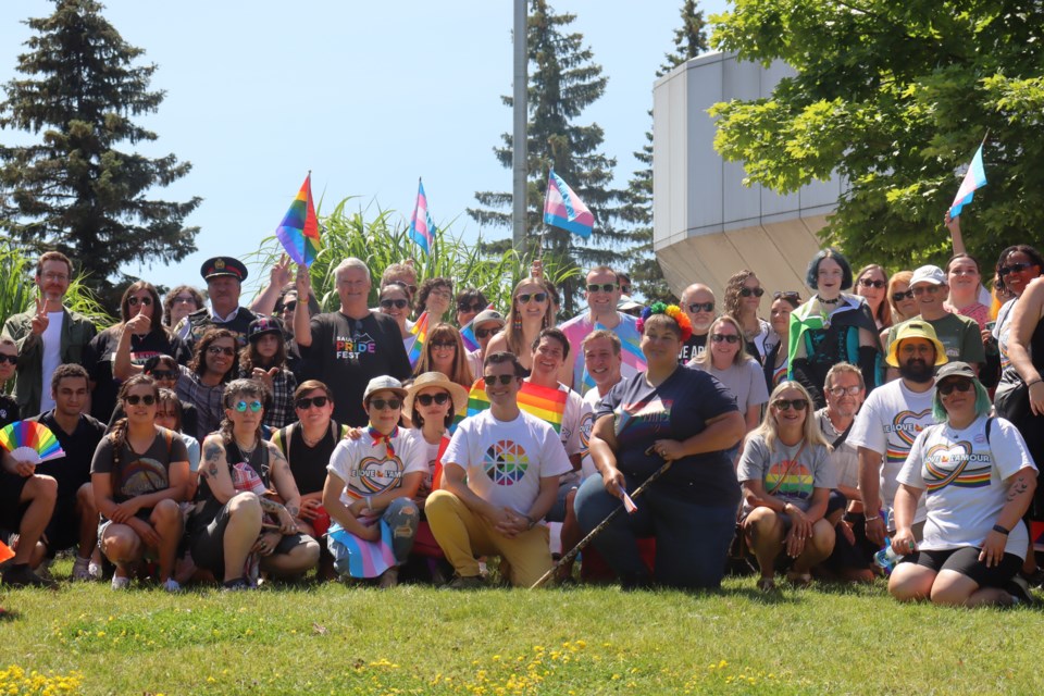 Members and allies of the 2SLGBTQIA+ community gathered at city hall on Sunday for a flag raising to mark the beginning of Sault Pridefest's 11th annual festivities. 