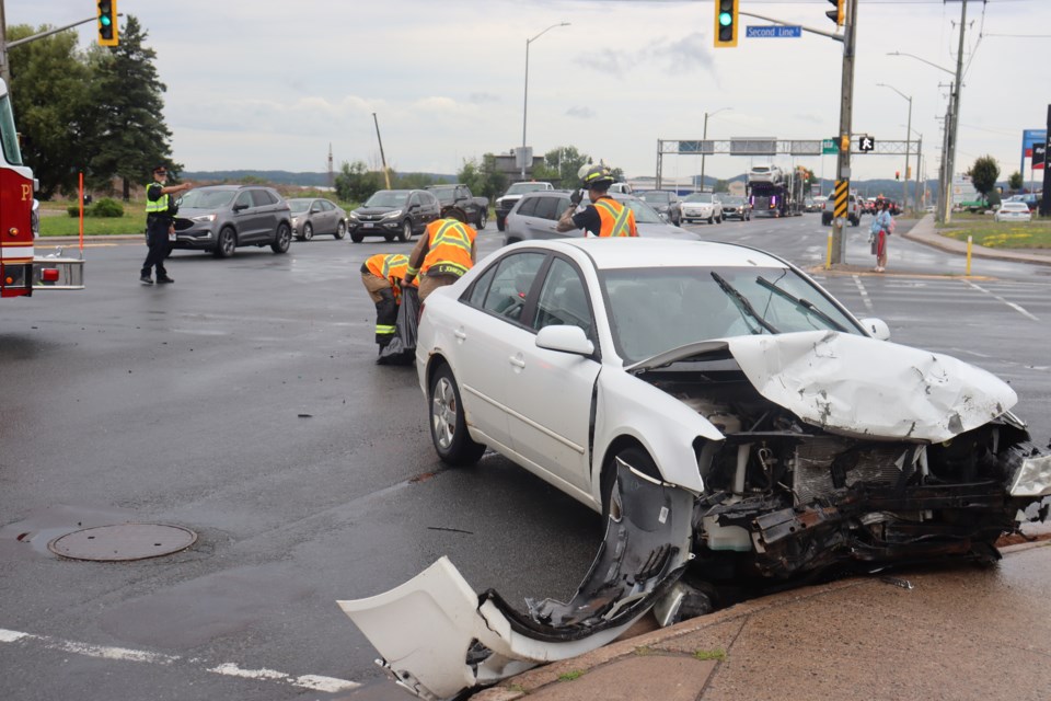 Two vehicles faced significant damages to their front-ends following a collision at the busy central intersection around 1 p.m. on Tuesday.