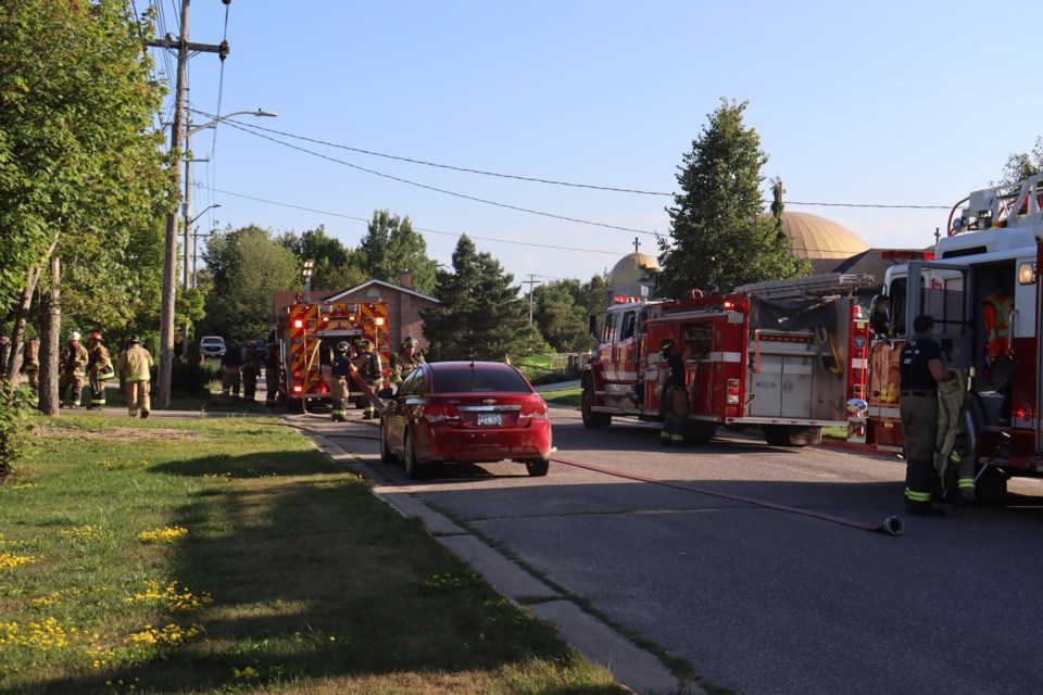 Fire crews and an ambulance were in the central area Tuesday evening after smoke could be seen coming from a Reid St. home.