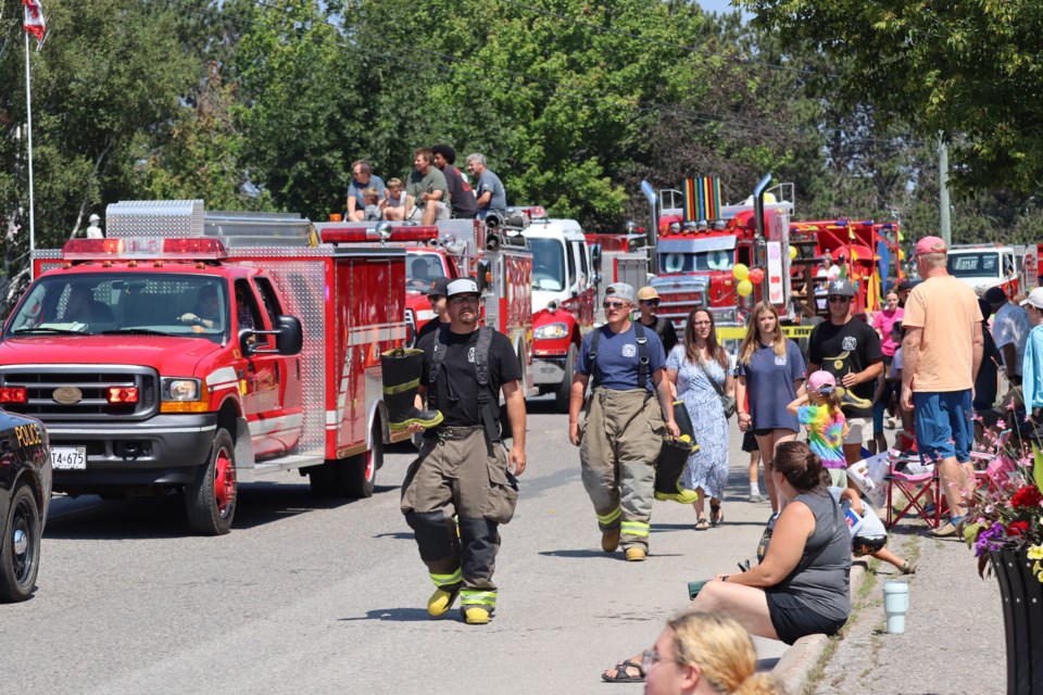 A carnival-themed parade drew hundreds along Main Street in Thessalon on Saturday as the town celebrated its August long weekend Community Days.