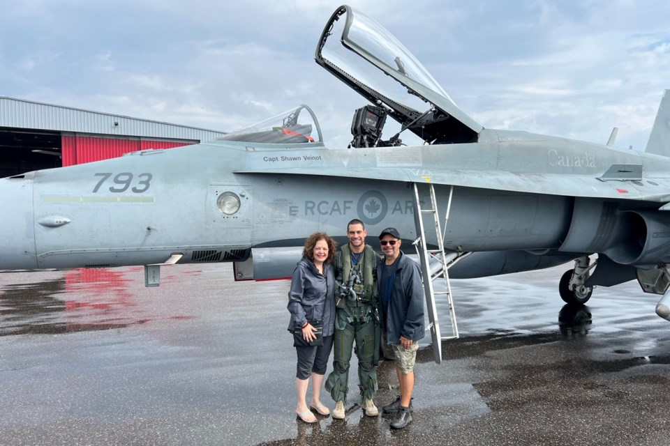 Major Dion Marson is pictured in front of a CF-18 Hornet with his parents Dionisia and Paul; he piloted the impressive aircraft for a memorable hometown show along the waterfront for thousands of spectators on Saturday. 