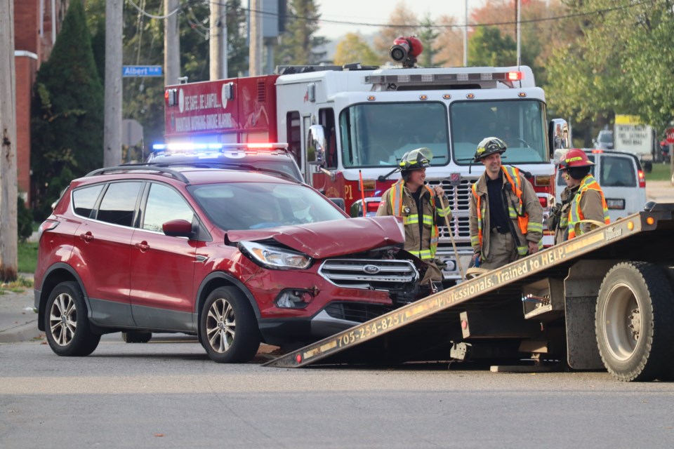 A vehicle with damage to its front end was taken from the scene after colliding with a school bus on the morning of Oct. 4, 2023.