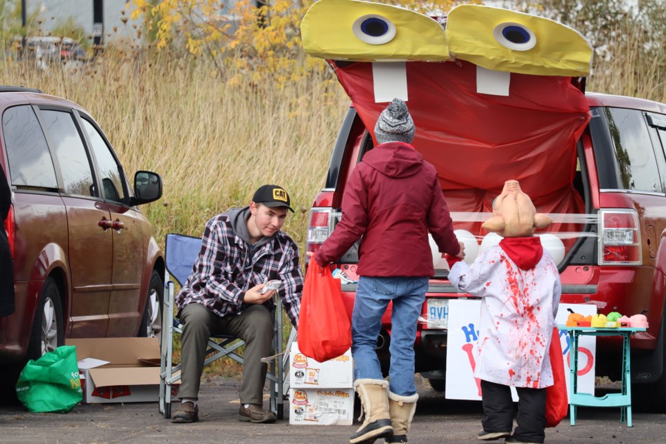 Dozens of kids and their families came together at the Northwood Funeral Home parking lot on Saturday for the the Algoma Autism Foundation's 10th annual Trunk or Treat. 