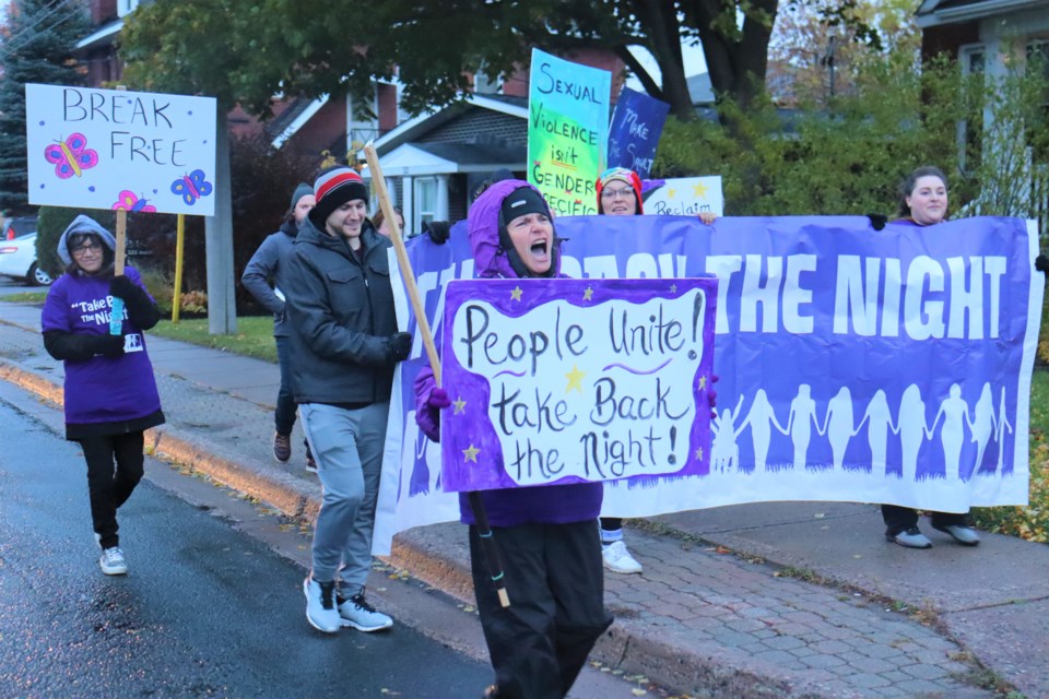 Residents showed their support for victims of violence and abuse on Tuesday by marching through the downtown core as part of this year's 'Take Back the Night March.'