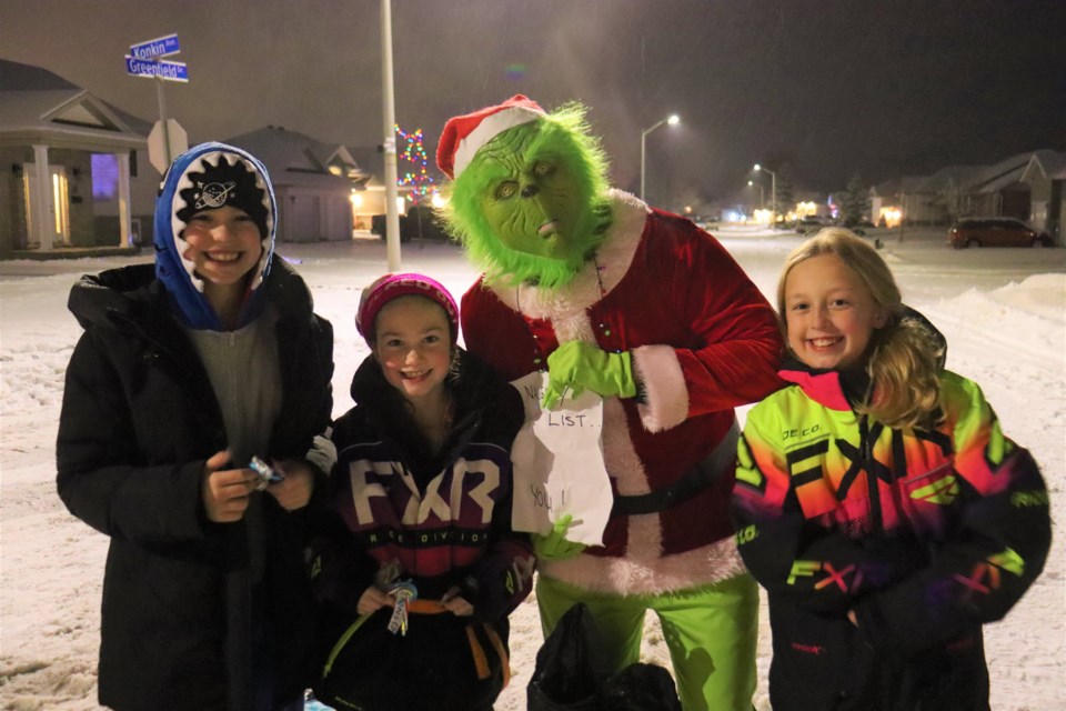 Dozens of families in the Greenfield subdivision came together Saturday night for their neighbourhood's 3rd annual holiday street party.