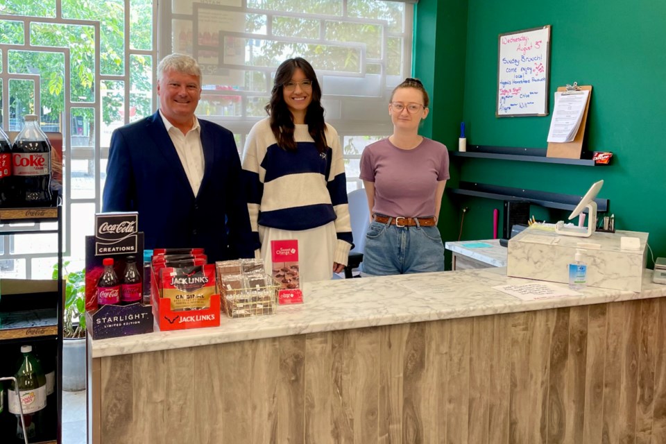 from left: MP Terry Sheehan, Allegra, and Chloe.