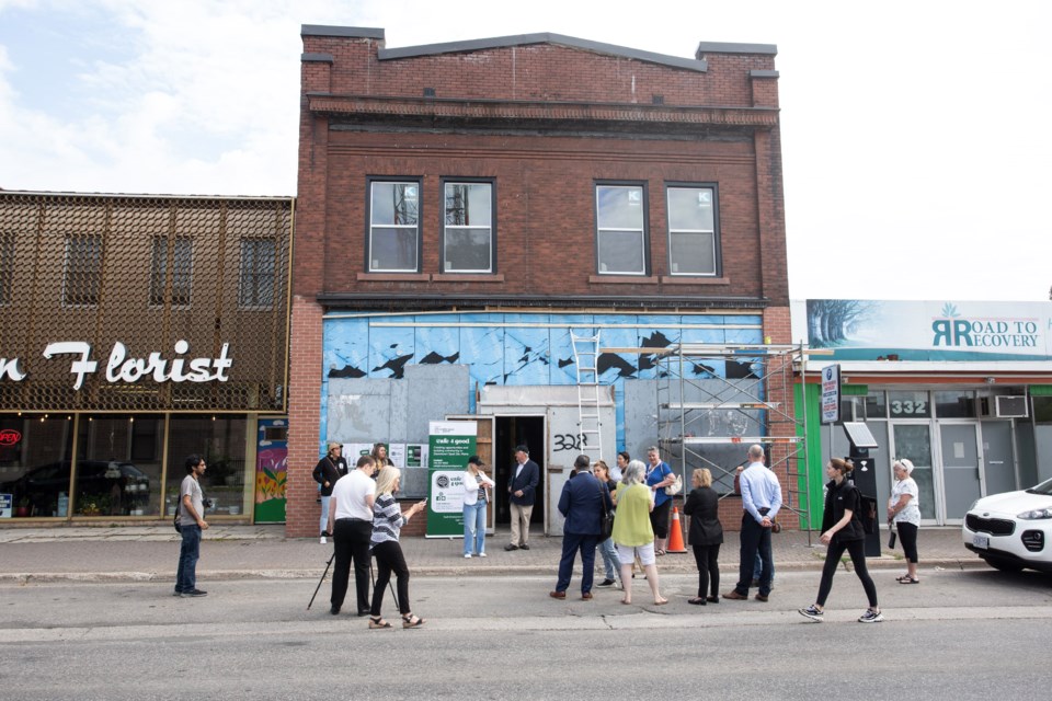 A formerly derelict building is in the process of being renovated by its owner Carmen Muto Plumbing and Heating. A new Cafe 4 Good will open in the near future on its main floor.