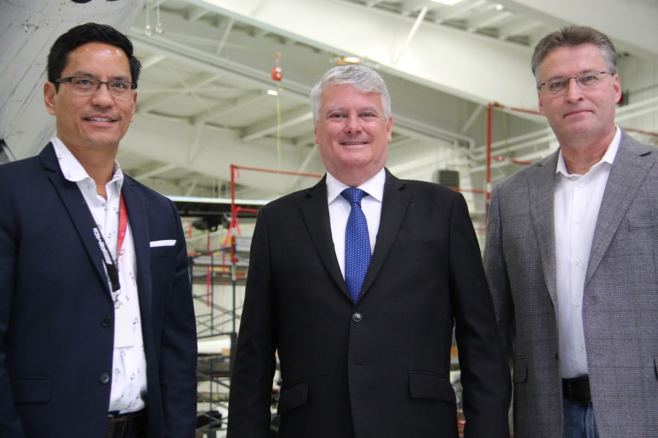 Sault MP Terry Sheehan with Julian Chin, JD Aero managing director of operations and finance and Don McNabb, JD Aero managing director of operations and development, Oct. 11, 2023.