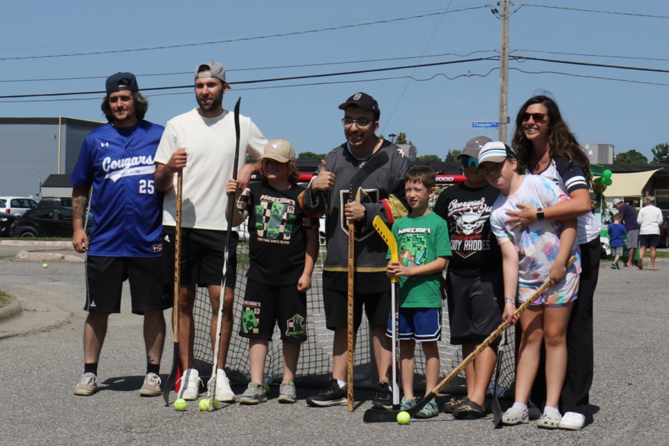 Ottawa Senators forward Michael Amadio played street hockey with kids during the annual 'Game On Street Party' hosted by Social Services Sault Ste. Marie on Albion Street Thursday.