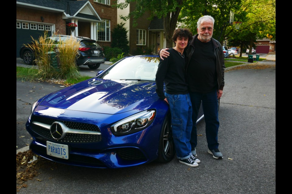 My grandfather, Pierre Paradis, and I in front of his 2019 Mercedes SL550 before attending an Ottawa car meet 