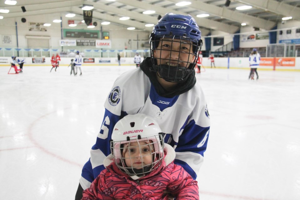 Players from the Sault College Cougars women’s hockey team and Soo Jr. Greyhound Girls team introduced young children to skating at Motivate 2 Skate 4 Girls in honour of Debbie Sims at YNCU Soo Pee Wee Arena, Nov. 6, 2024. Darren Taylor/SooToday 