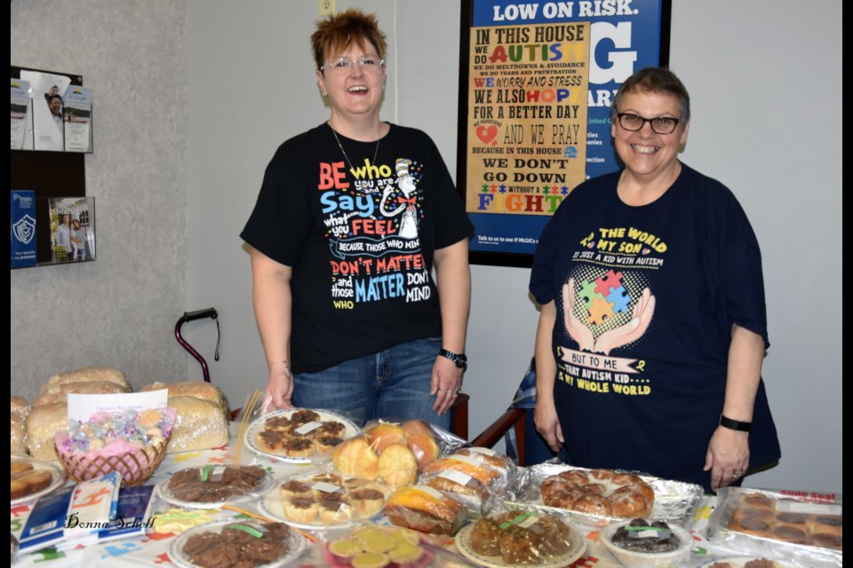 Rhonna Bomhof and Kim Coulter sell baked goods at Northern Credit Union in Richards Landing to raise awareness of and funds for autism. Donna Schell for SooToday