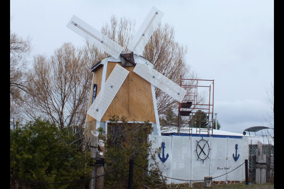 Tucked in a quiet corner of Richards Landing a lighthouse and relative nautical items