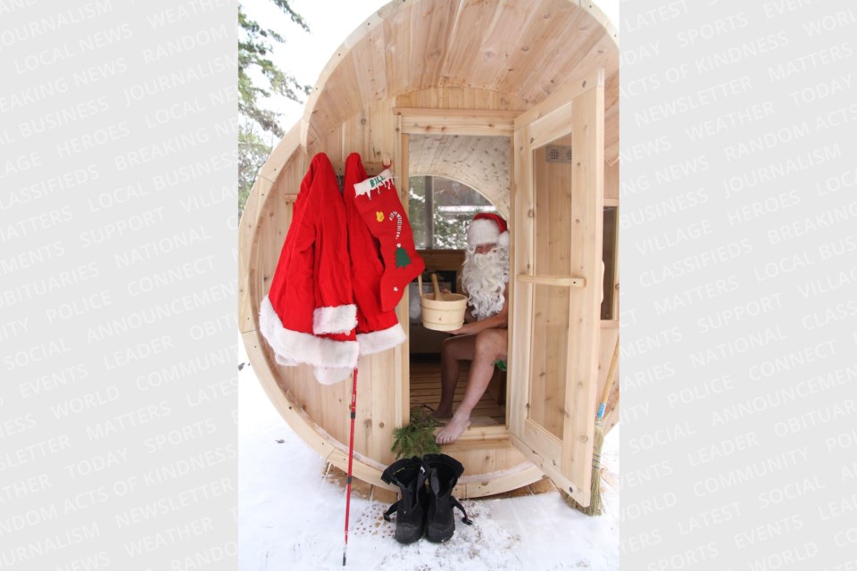 Santa (BRBill)  is getting ready for a sweat at the new Canadian
Ecology Centre sauna.  