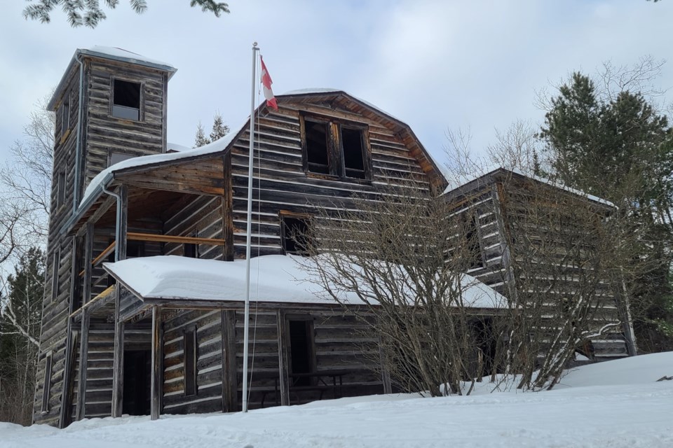 A winter shot of the three-storey, with a four-storey turret of the iconic White Otter Castle.