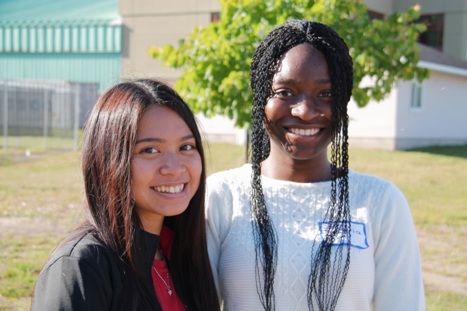 Returning Algoma University students Cassandra Chia and Victoria Zikioie were on hand to help first year students moving into the university’s residence, Aug. 31, 2019. Darren Taylor/SooToday
