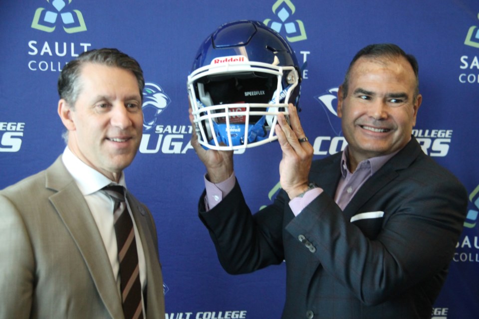 David Orazietti, Sault College president and Michael Garcia, Algoma Steel chief executive officer after the college received $65,000 in funding from Algoma Steel for Sault College athletics programs, Sept. 10, 2024. Darren Taylor/SooToday 