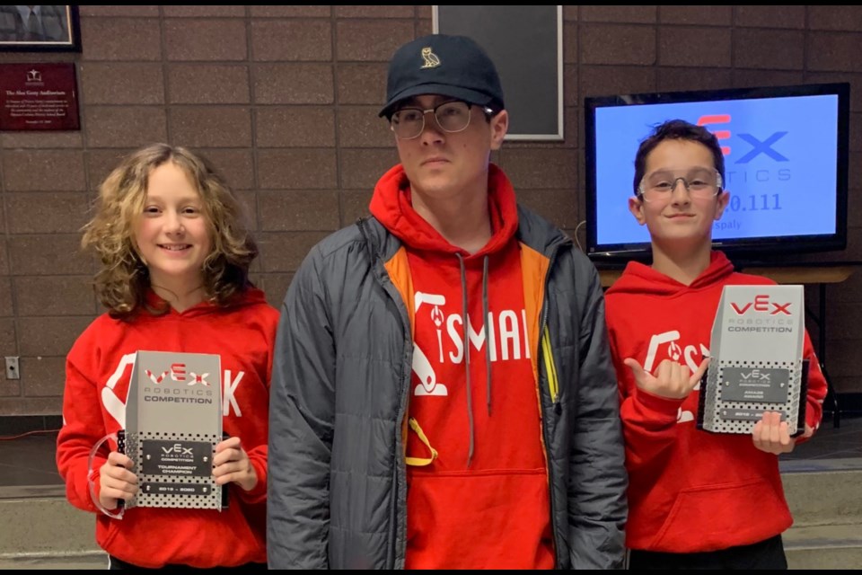 Family affair: Ila, Shail and Kavi Giroux (left to right) of Team iSMAK will compete in this year's VEX Robotics World Championship, which takes place April 22-28 in Louisville, Kentucky. Photo supplied. 