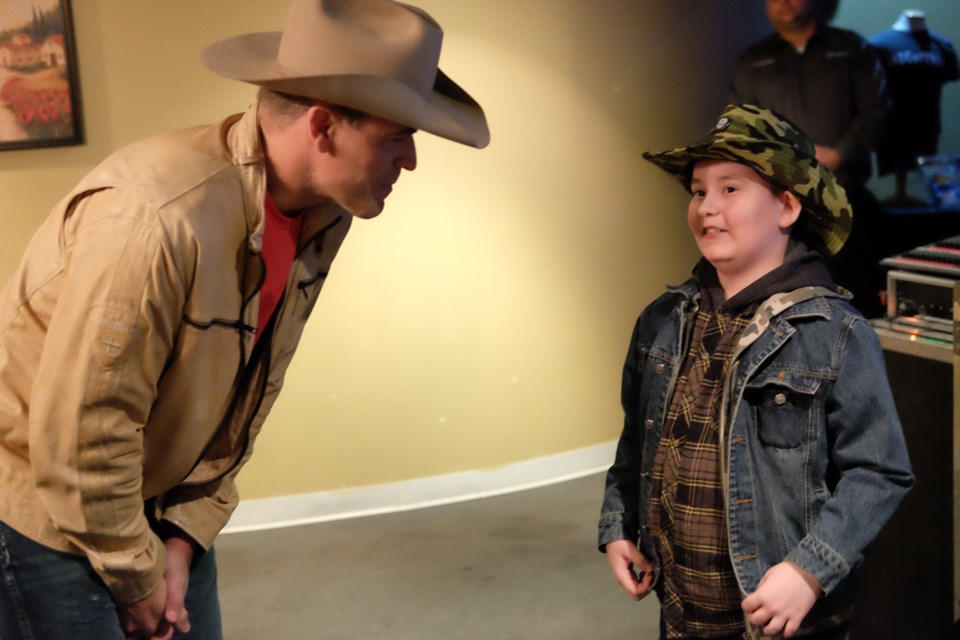 During a private meet and greet before his concert on Sunday, George Canyon met with Sault area people who have type 1 diabetes. Canyon found out he had the disease himself when he was 14. Photo by Jeff Klassen for SooToday