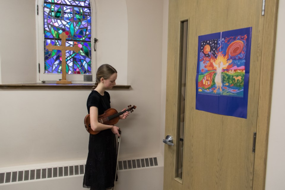 Violinist Malia Kirk is nervous before performing at the Rising Star Competition at St. Luke's Cathedral on Sunday. The competition was part of the 80th annual Sault Ste. Marie Music Festival. Jeff Klassen/SooToday